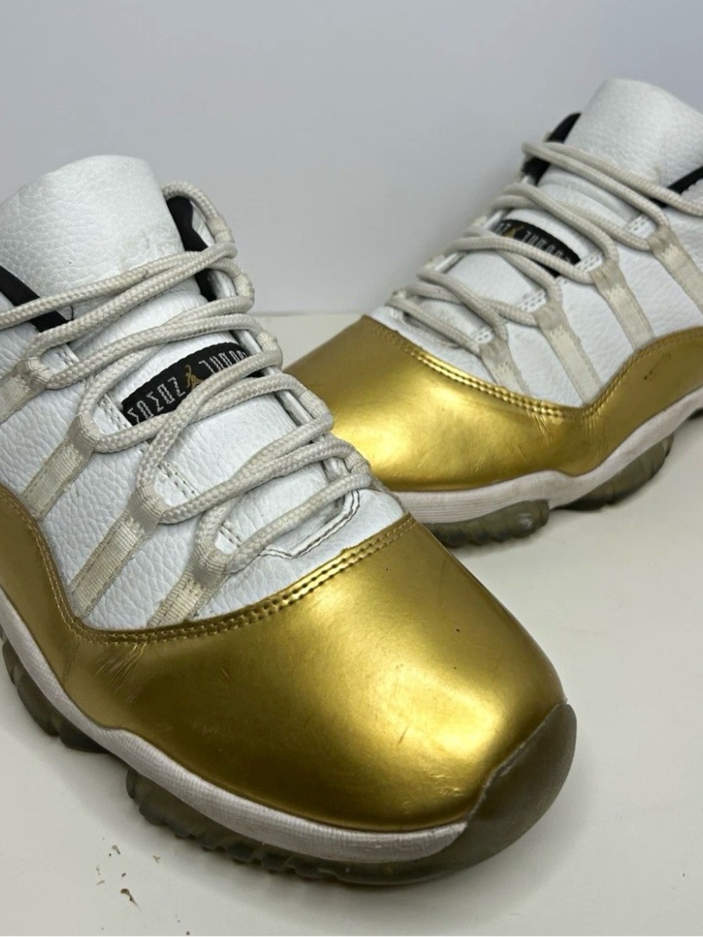 Jordan Air Jordan 11 Low Top Leather Sneakers White Gold Black Lace-Up Men